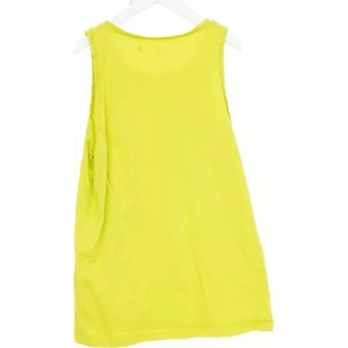 Neongul tanktop med spillekonsoller fra H&M (str. 164)