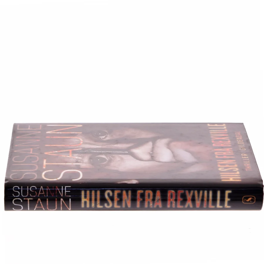 Hilsen fra Rexville : thriller af Susanne Staun (Bog)
