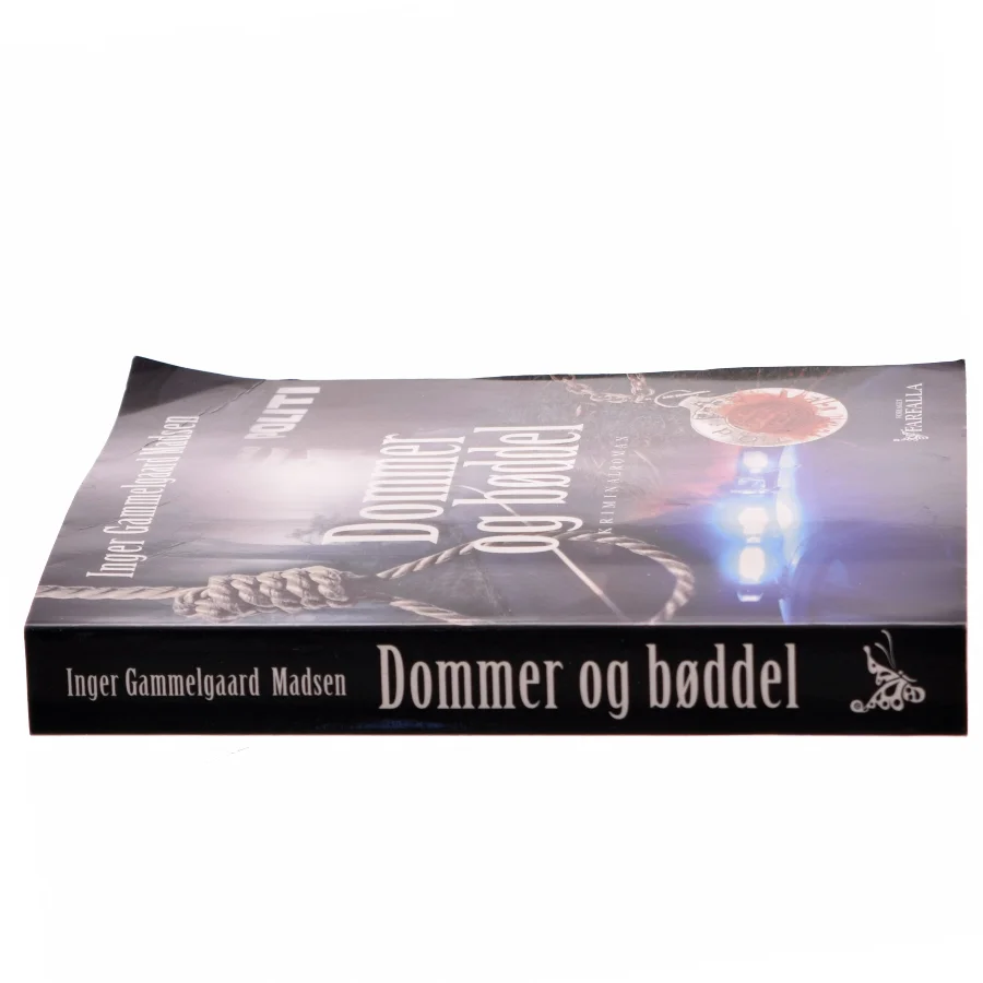 Dommer og bøddel : kriminalroman af Inger Gammelgaard Madsen (Bog)