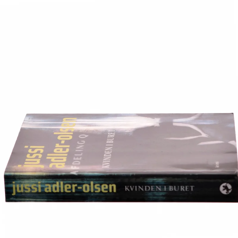Kvinden i buret : krimi af Jussi Adler-Olsen (Bog)