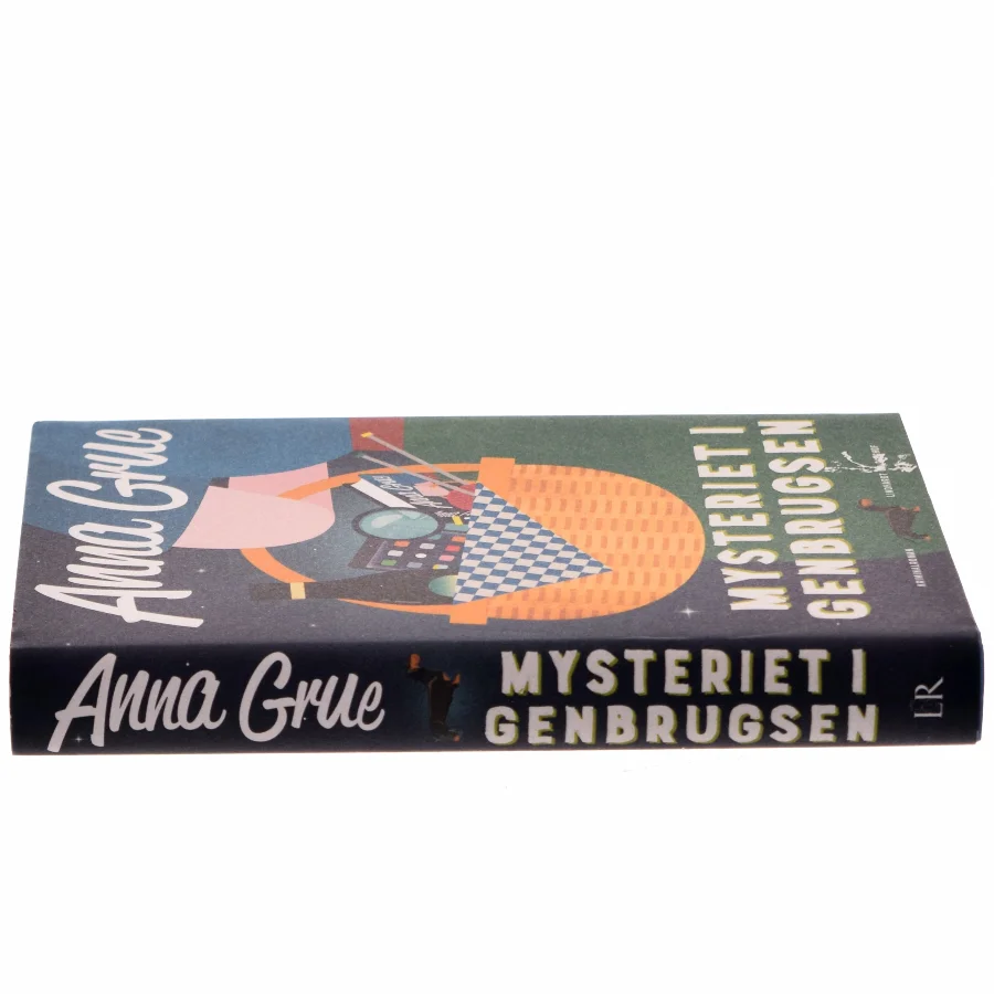 Mysteriet i Genbrugsen : kriminalroman af Anna Grue (Bog)