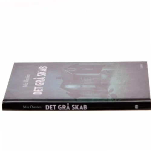 Det grå skab af Mia Öström (Bog)