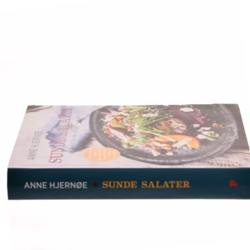 Sunde salater : 201 opskrifter der smager og mætter af Anne Hjernøe (Bog)