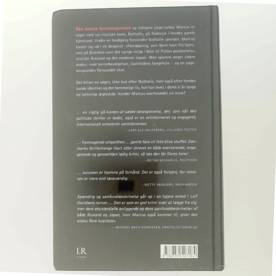 Den ukendte hustru : roman af Leif Davidsen (Bog)