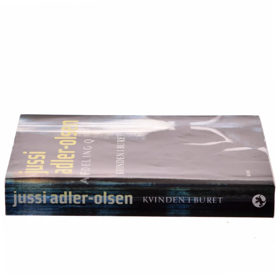 Kvinden i buret : krimi af Jussi Adler-Olsen (Bog)