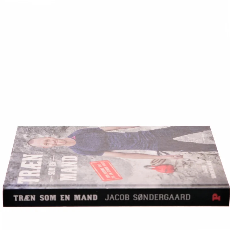 Træn som en mand : den nemme vej til en stærk krop af Jacob Søndergaard (f. 1980) (Bog)