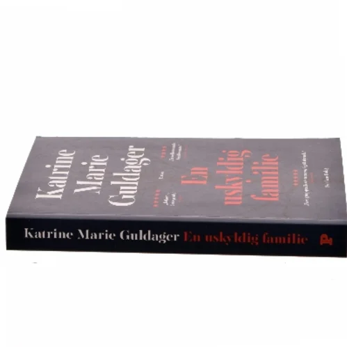 En uskyldig familie af Katrine Marie Guldager (Bog)