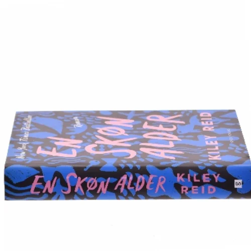En skøn alder : roman af Kiley Reid (f. 1984) (Bog)