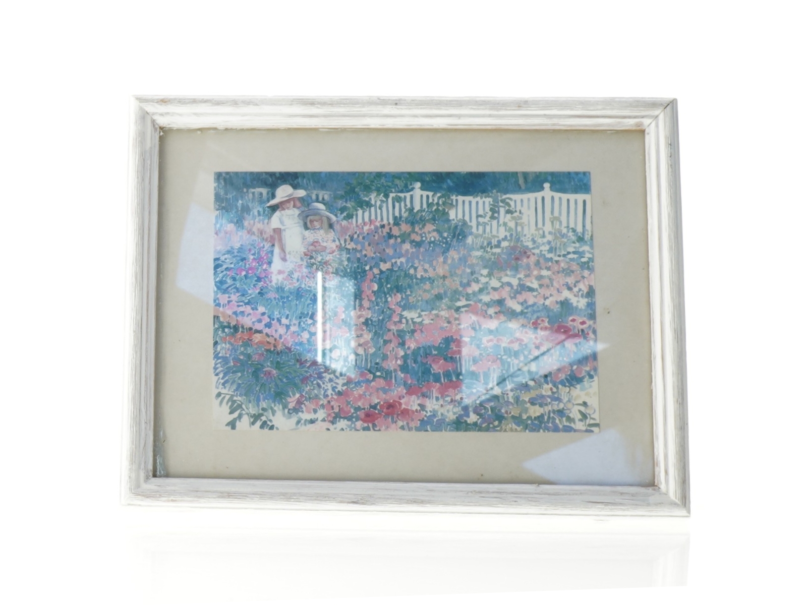 Indrammet billede med have motiv (str. 27 x 21 cm)