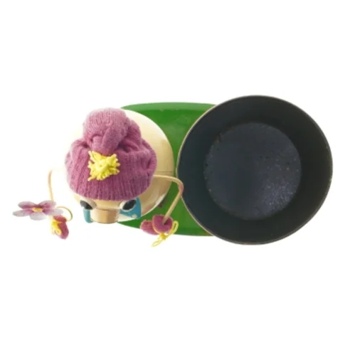 Sjov figur med plantekurukke/sangskjulee