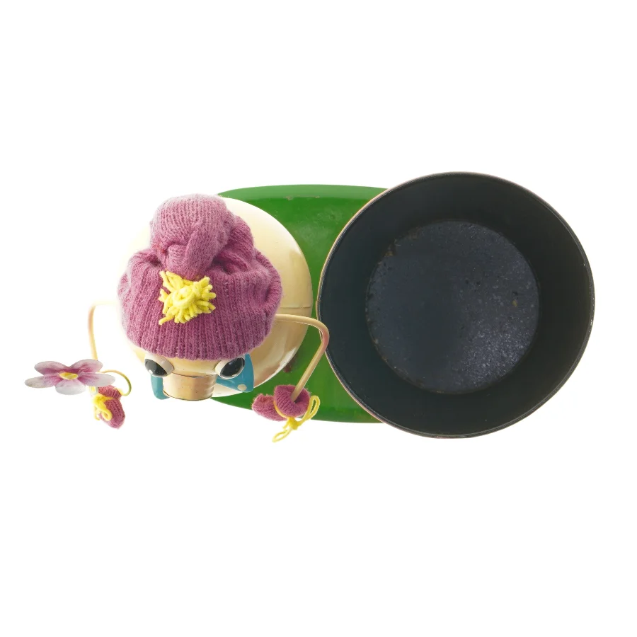 Sjov figur med plantekurukke/sangskjulee