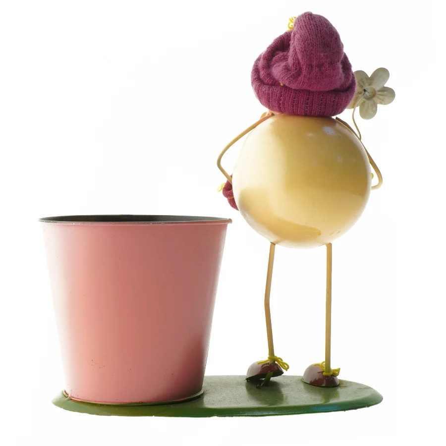 Sjov figur med plantekurukke/sangskjulee