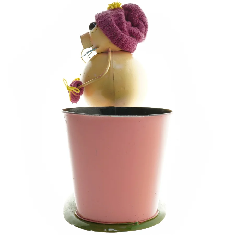 Sjov figur med plantekurukke/sangskjulee