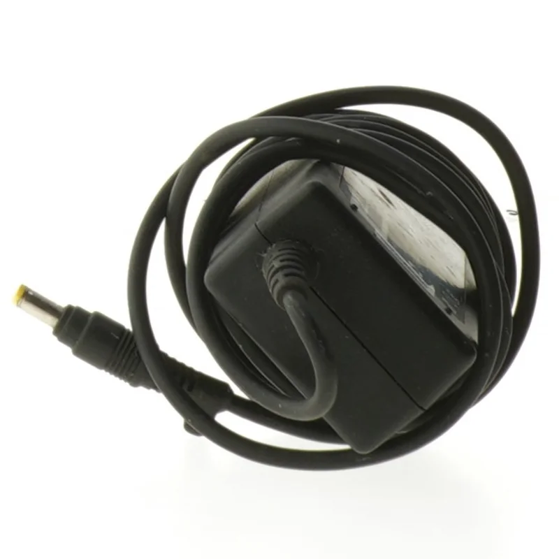 Strømforsyning til bærbar computer fra HP (str. 10,5x4,5 cm)