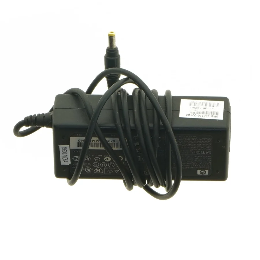 Strømforsyning til bærbar computer fra HP (str. 10,5x4,5 cm)