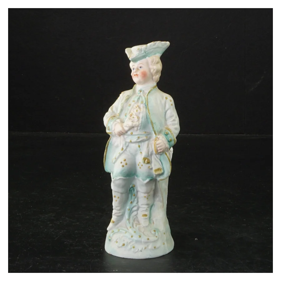 Porcelænsfigur af mand i historisk dragt