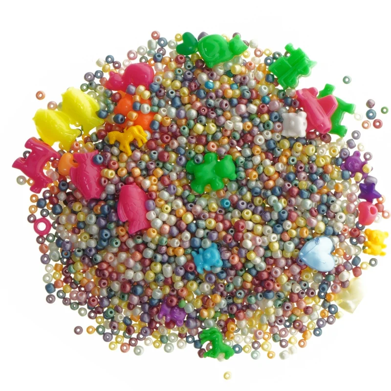 Plastikperler i gennemsigtig beholder (str. Ø 7x7,5 cm)