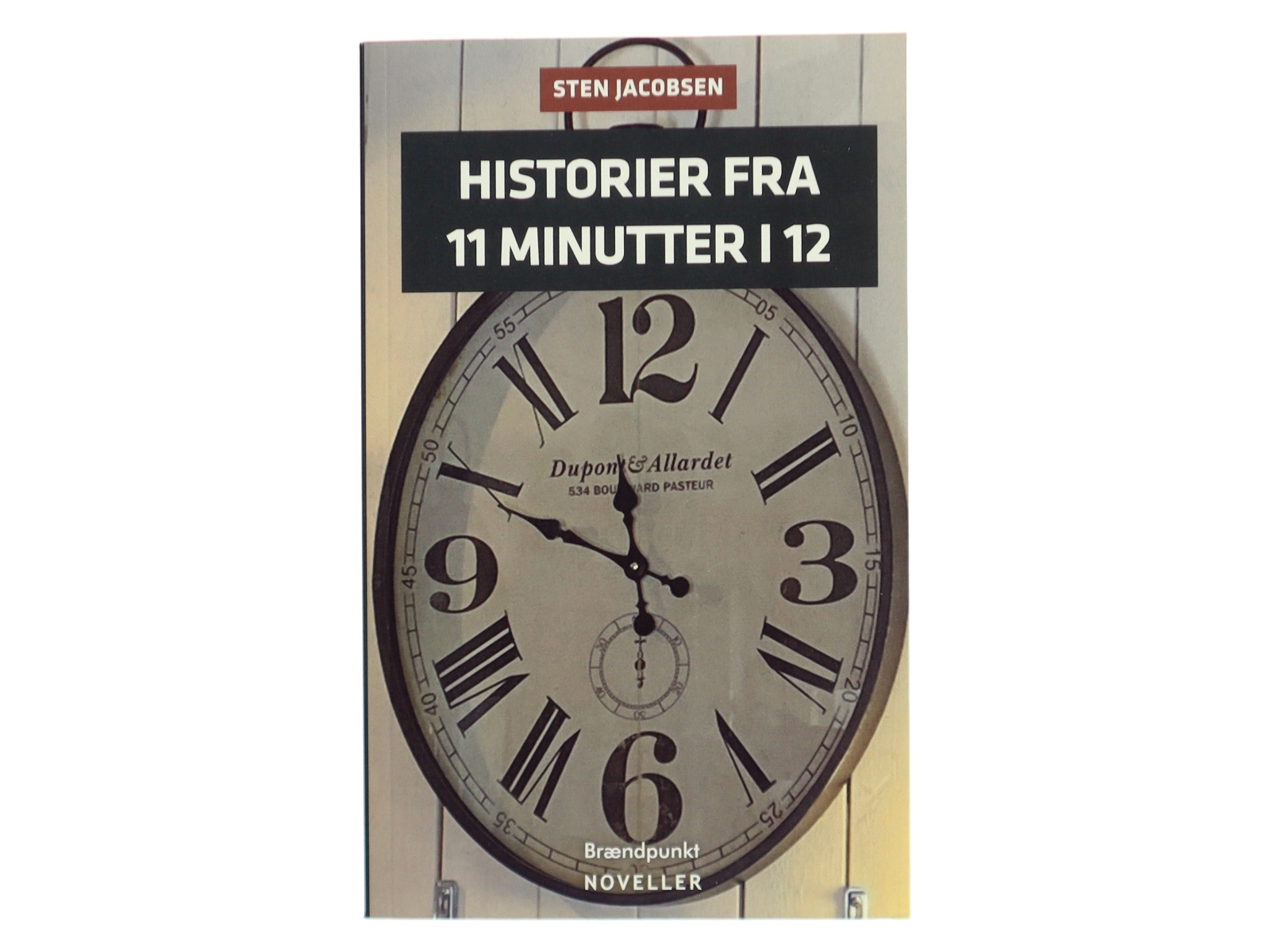 Historier fra 11 minutter i 12 : noveller af Sten Jacobsen (f. 1947) (Bog)