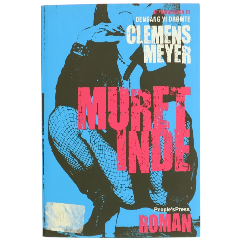 Muret inde : roman af Clemens Meyer (f. 1977) (Bog)