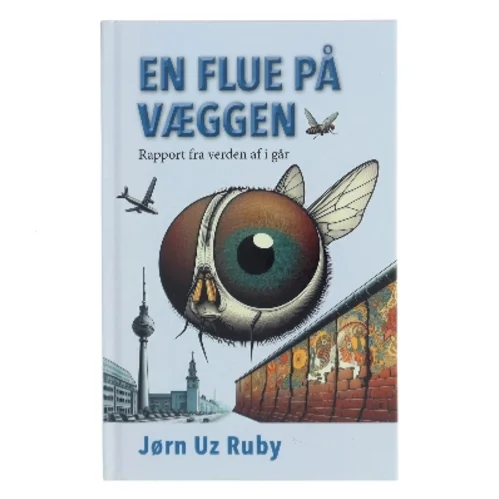 En flue på væggen : rapport fra verden af i går af Jørn Uz Ruby (Bog)
