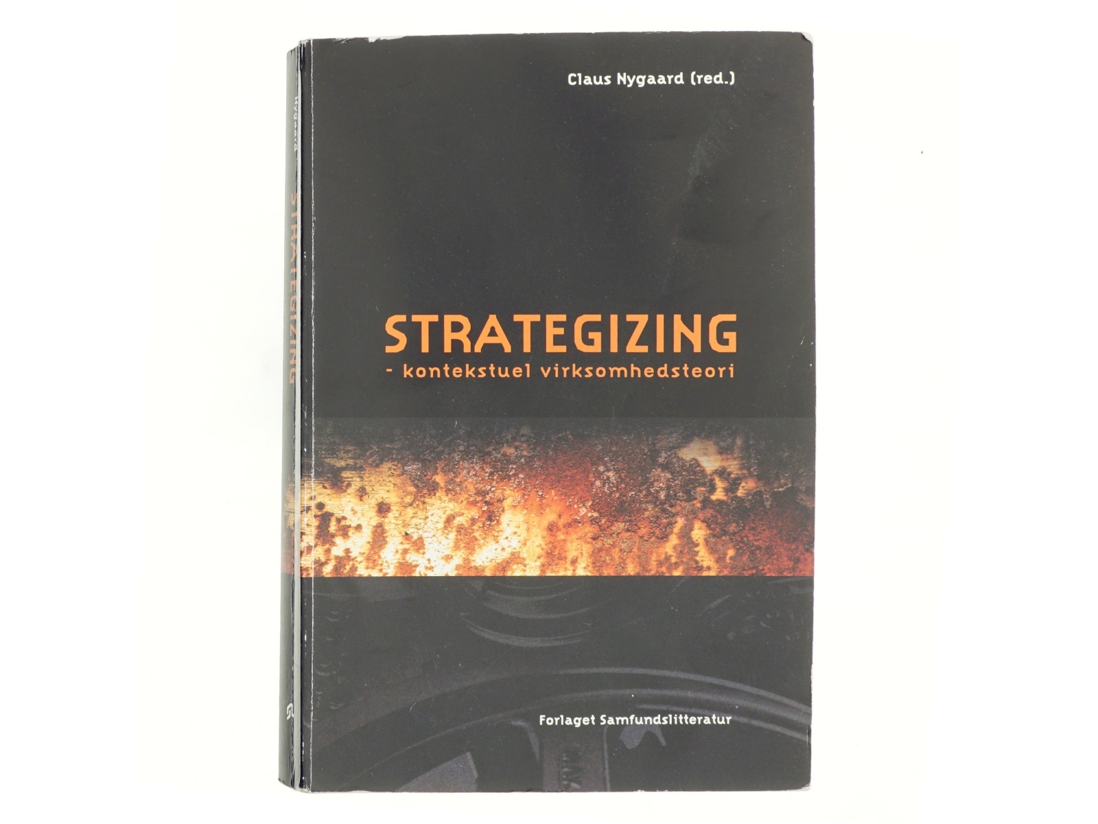 Strategizing - kontekstuel virksomhedsteori af Claus Nygaard (f. 1968-10-31) (Bog)