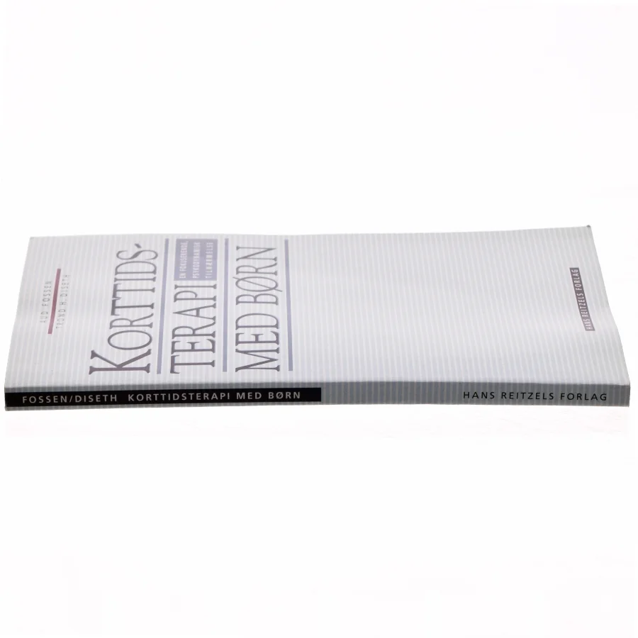 Korttidsterapi med børn : en fokuserende, psykodynamisk tilnærmelse (Bog)
