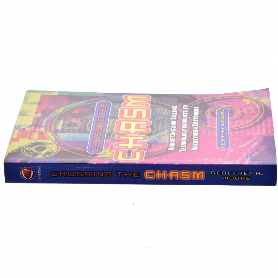 Crossing the chasm af Geoffrey A. Moore (Bog)