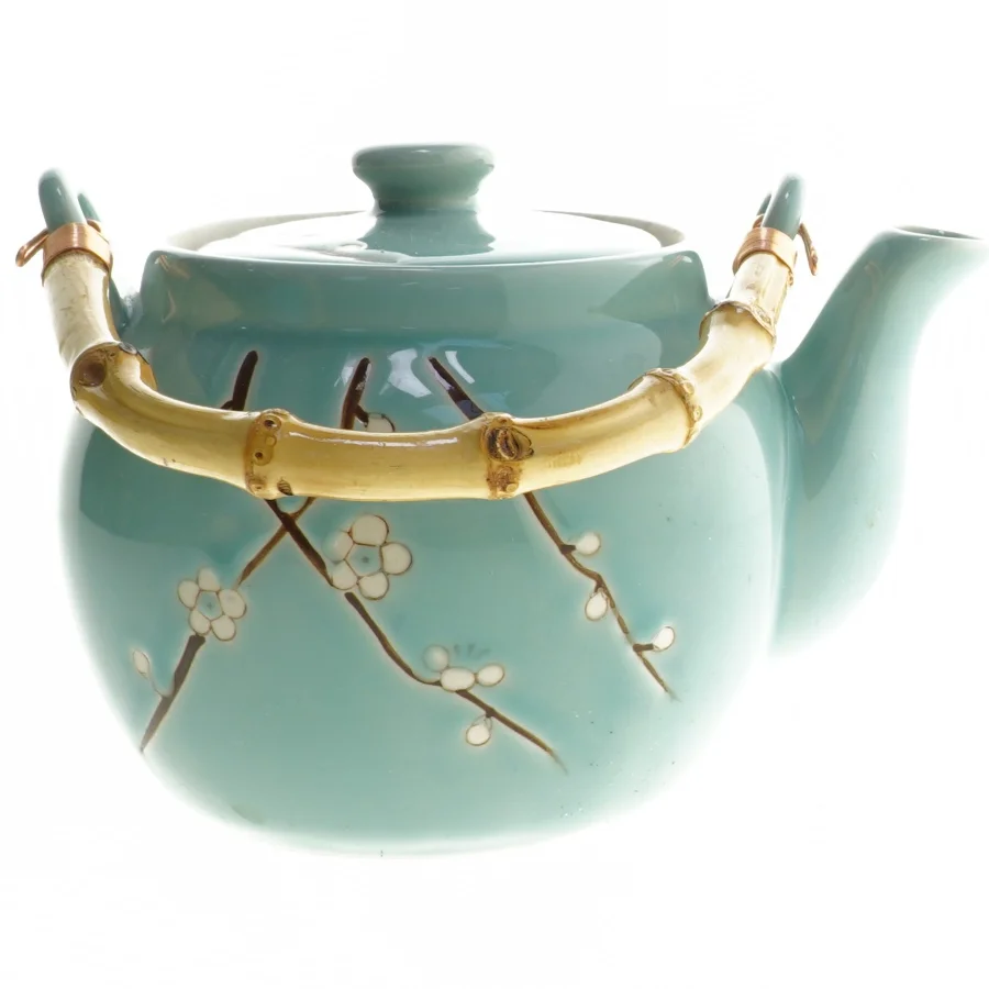 Keramik tekande med blomstermotiv fra Tiger (str. Ø 15 cm)