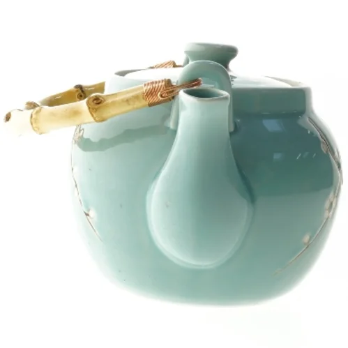 Keramik tekande med blomstermotiv fra Tiger (str. Ø 15 cm)