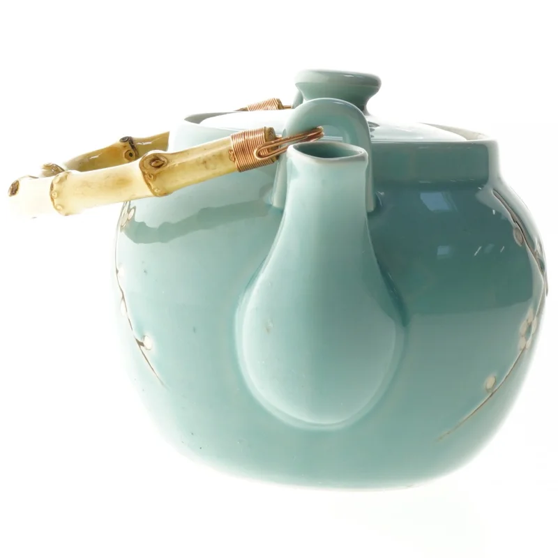 Keramik tekande med blomstermotiv fra Tiger (str. Ø 15 cm)