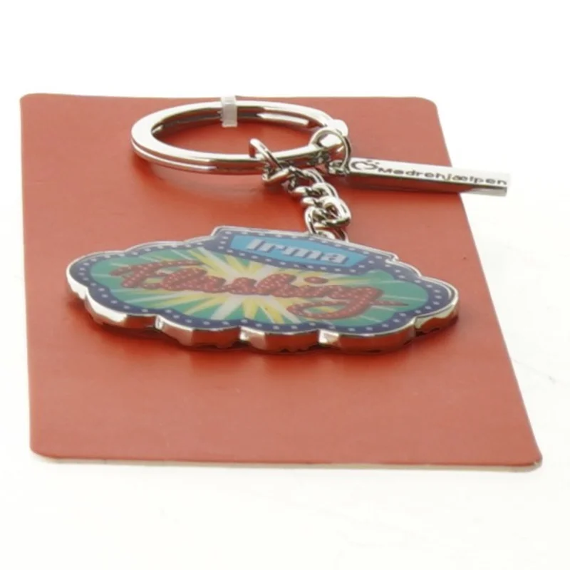 NY Irma nøglering fra Irma og Kritisk Pynt (str. 14 x 6 cm)