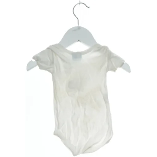 Hvid bodystocking med hundemotiv fra Anna Bassetti (str. 62)