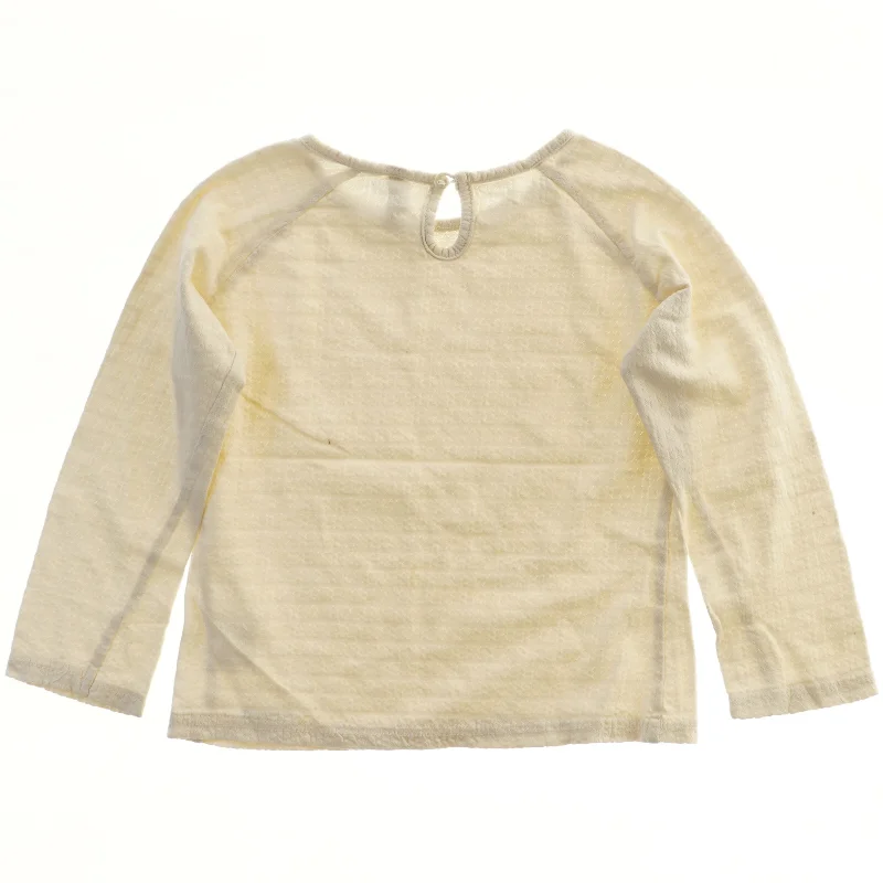 Langærmet bluse fra Pomp de Lux (str. 98)