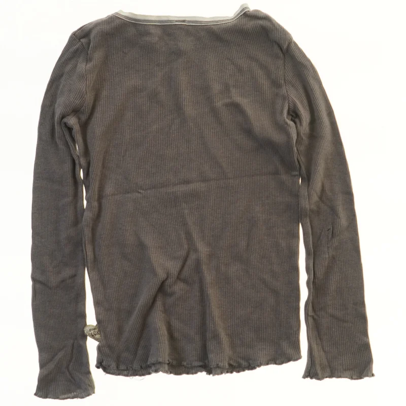 Langærmet bluse fra Pomp de Lux (str. 104)