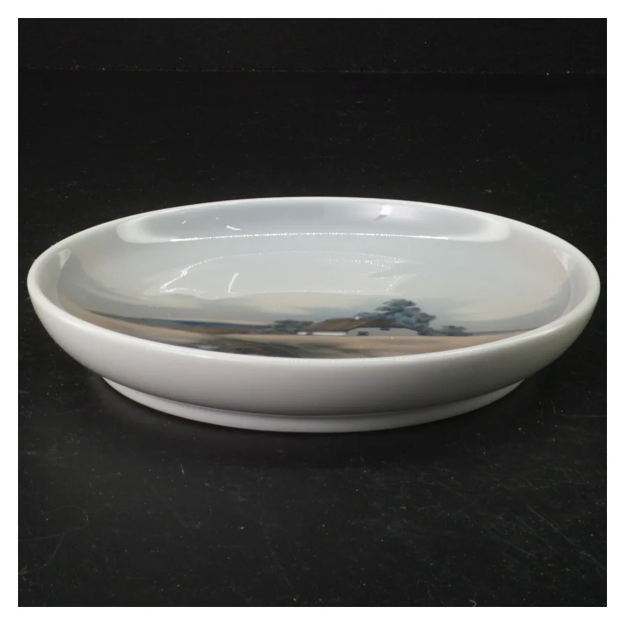 Hvid porcelænstallerken (str. 16 cm i diameter)