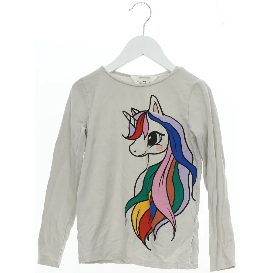 Langærmet T-shirt med enhjørningmotiv fra H&M (str. 122) fra H&M (str. 122)