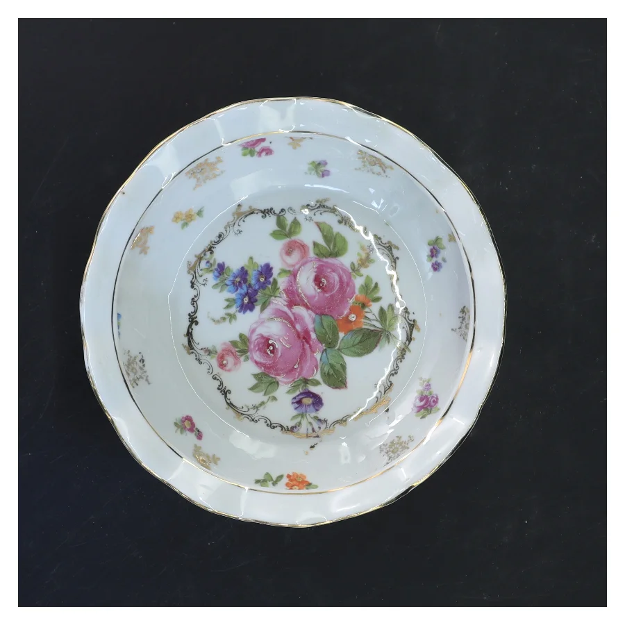 Dekorativ porcelænsskål (str. 9x16 cm)