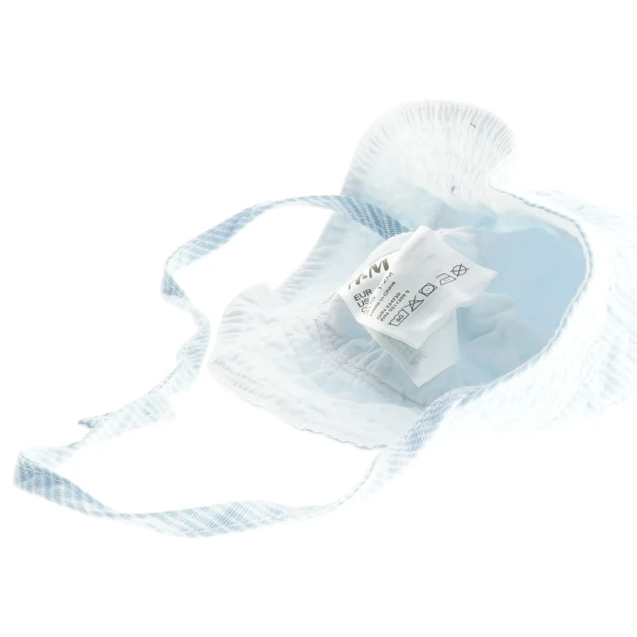 Blå og hvid stribet solhat til baby fra H&M (str. 56)