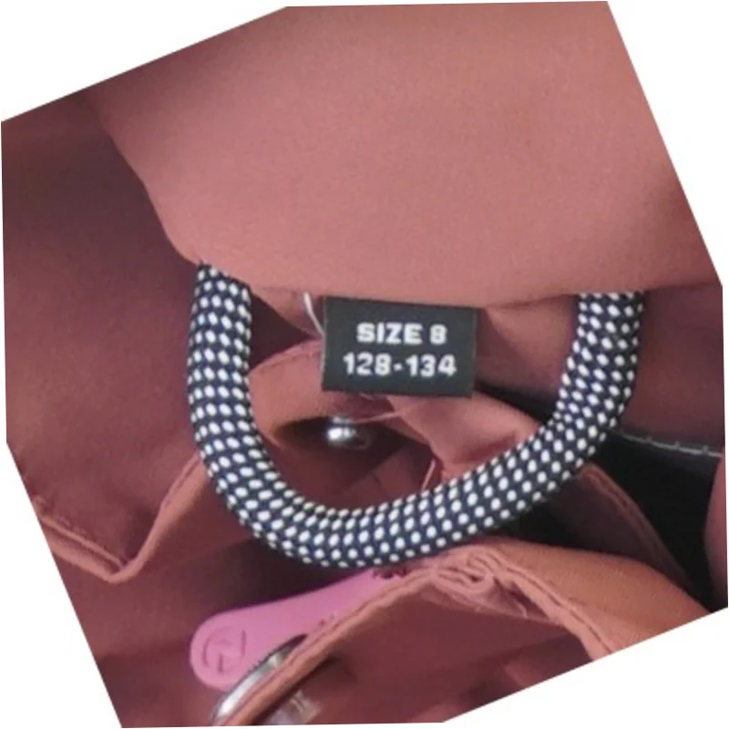 Regnjakke fra Zigzag (str. 128-134, Se billedet)