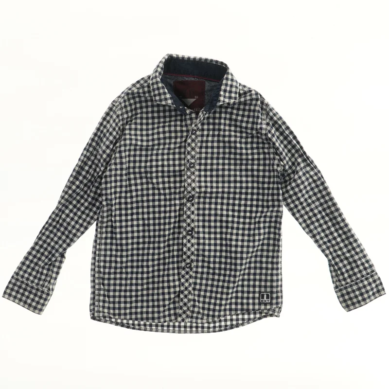 Skjorte med tern fra Next (str. 110)