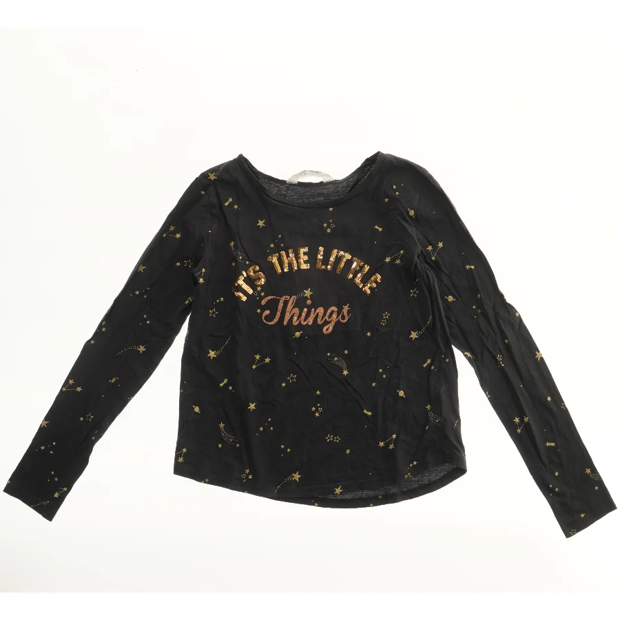 Langærmet bluse med stjerner fra H&M (str. 164)