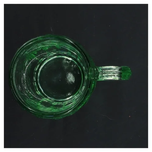 Vintage Grøn glaskrus med håndtag (str. Ø 5,5 cm længde 8 cm)