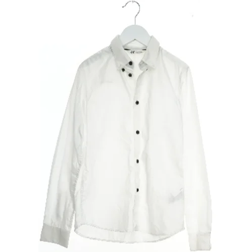 Hvid skjorte med lange ærmer fra H&M (str. 146)