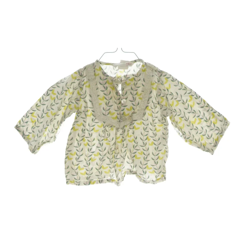 Bluse fra H&M (str. 68)