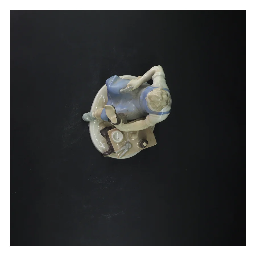 Porcelænsfigur af skomager (str. 21 cm)