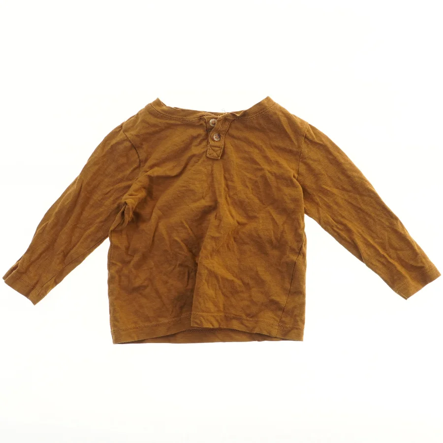 Langærmet bluse fra H&M (str. 92)