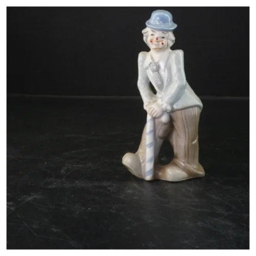 Porcelænsfigur af mand (str. 17x8,5 cm)