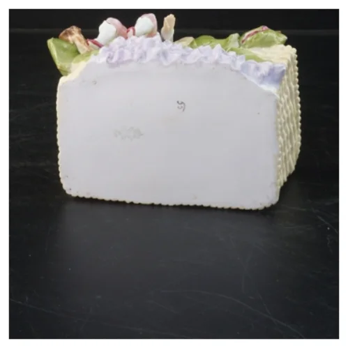 Dekorativ keramisk figurvase med dreng (str. 15x12x8 cm)