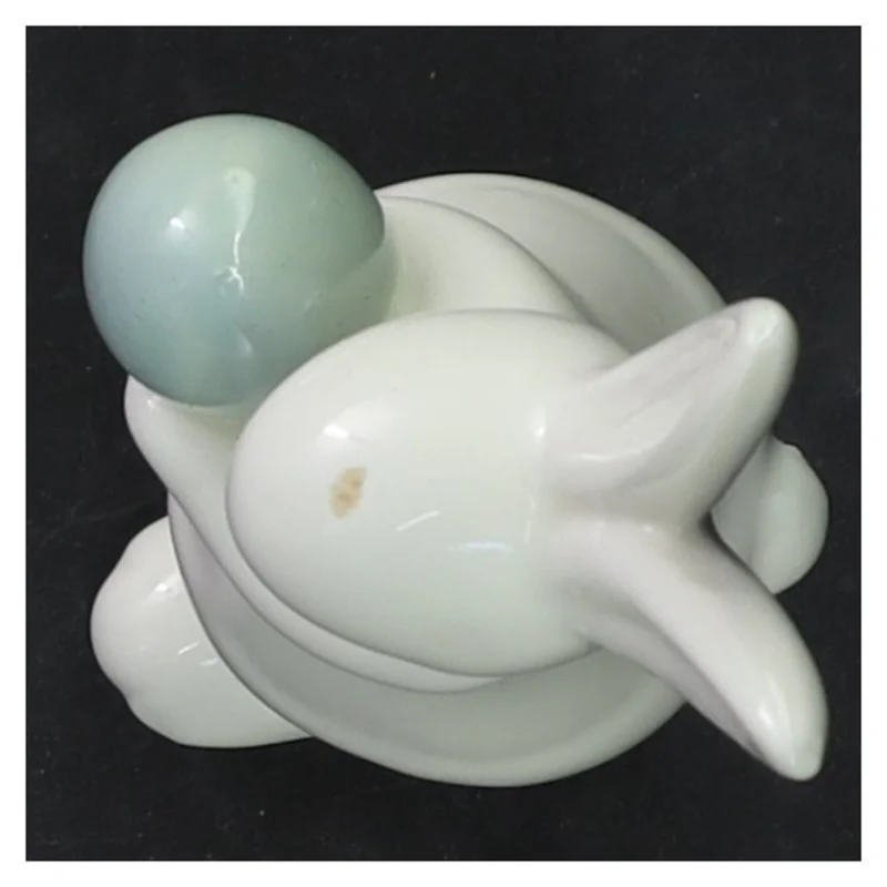 Porcelænsfigur af kanin med æg (str. 14 cm)