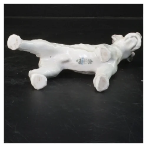 Porcelænsfigur af hund fra Royal Copenhagen (str. 15x14 cm)